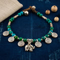 Handmade Thai Boho Bracelet with Green Stone and Silver Elephant Charm