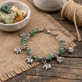 Green Stone Elephant Charm Bracelet for Women, Thai Handmade, Monk Blessed | Artisan Meadow