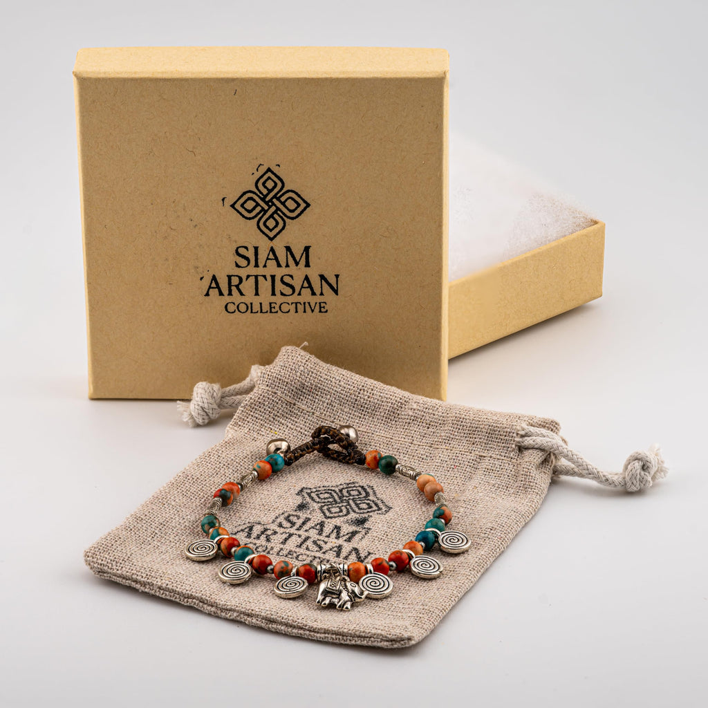 Siam Artisan Collective Boho Bracelet for Women – Turquoise & Orange Stone Beads with Elephant Charm and Spiral Accents – Handcrafted Thai Bohemian Jewelry – Stackable Mixed-Metal Accessory