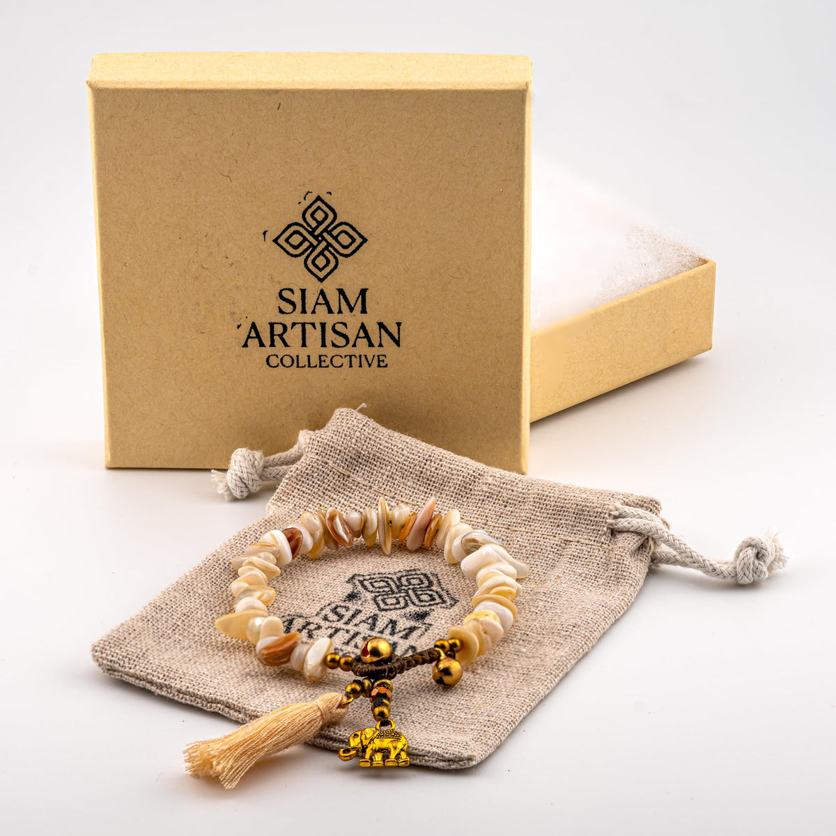 Siam Artisan Collective Boho Bracelet for Women – Natural Beige Chip Beads with Gold Accents, Tassel & Elephant Charm – Handcrafted Thai Bohemian Jewelry – Neutral Beach & Stacking Accessory