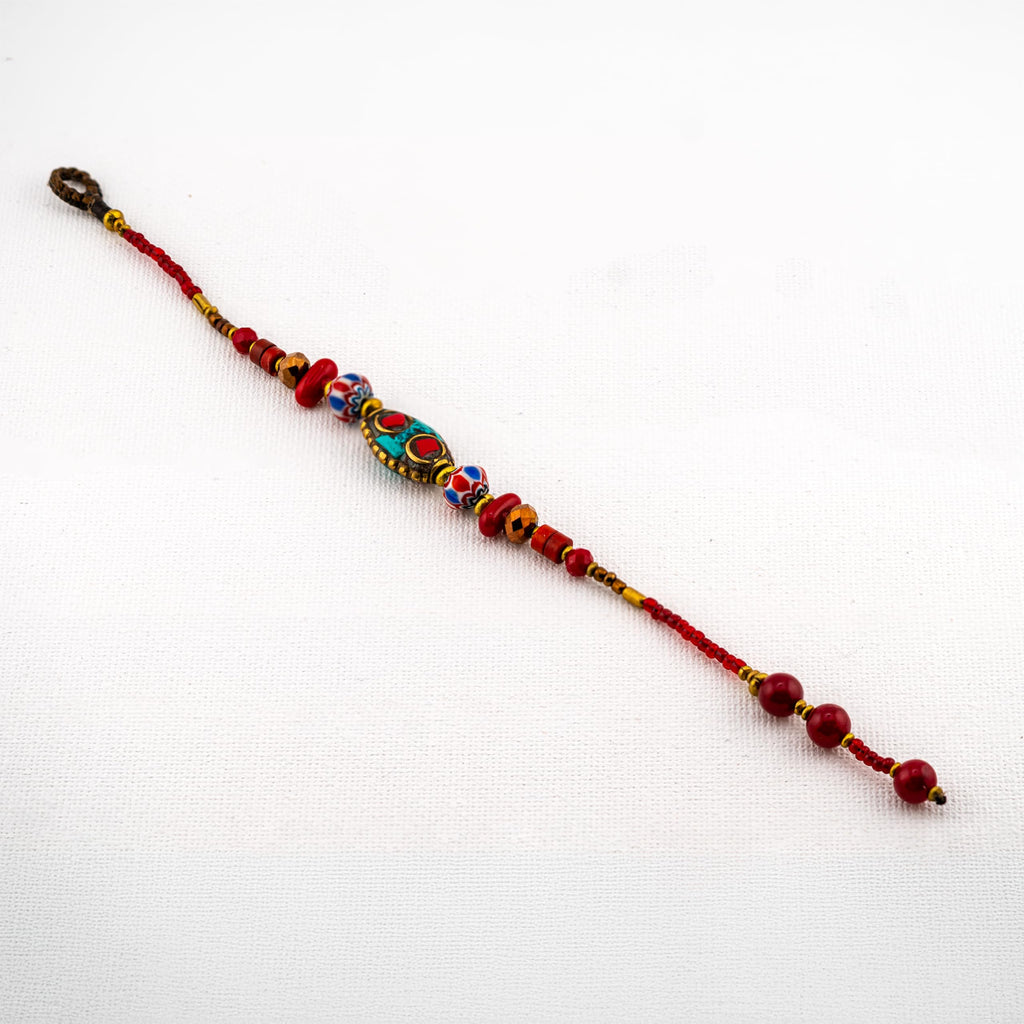 Artisan Nomad™ Tibetan-Style Beaded Bracelet – Handmade Boho Jewelry with Turquoise Inlay & Red Accents
