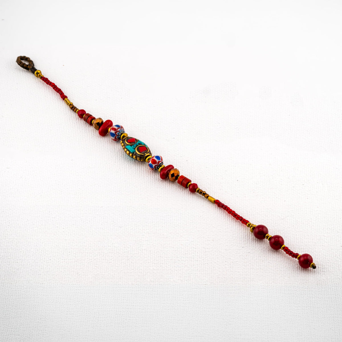 Artisan Nomad™ Tibetan-Style Beaded Bracelet – Handmade Boho Jewelry with Turquoise Inlay & Red Accents