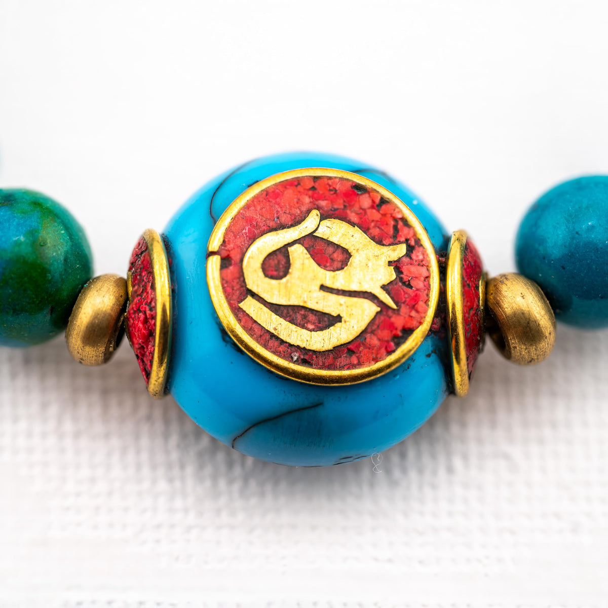 Artisan Mantra™ Turquoise Beaded Bracelet – Handmade Boho Jewelry with Tibetan Symbol Center Bead