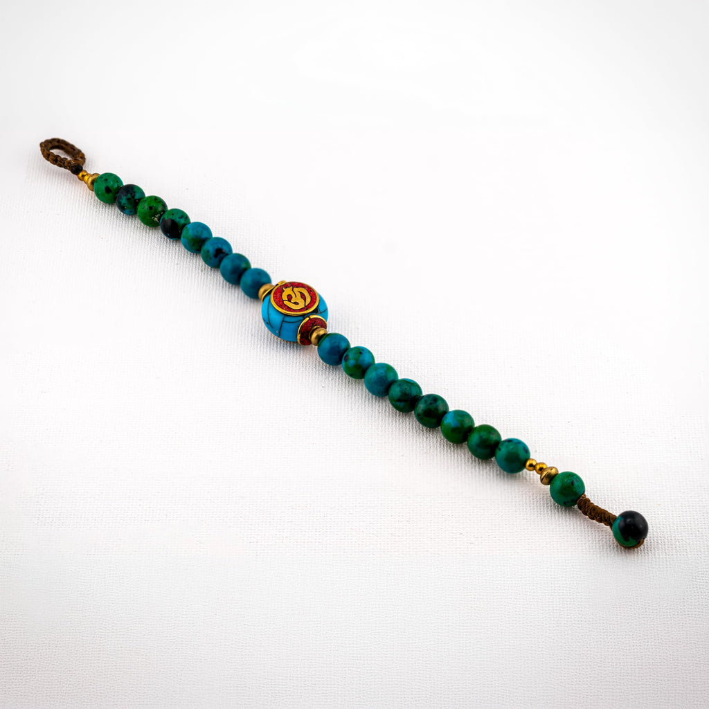 Artisan Mantra™ Turquoise Beaded Bracelet – Handmade Boho Jewelry with Tibetan Symbol Center Bead