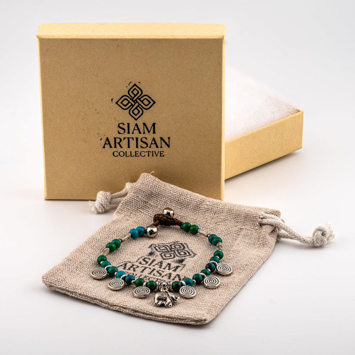 Artisan Spirit™ Boho Charm Bracelet – Handmade Beaded Jewelry with Spiral Accents & Elephant Charm