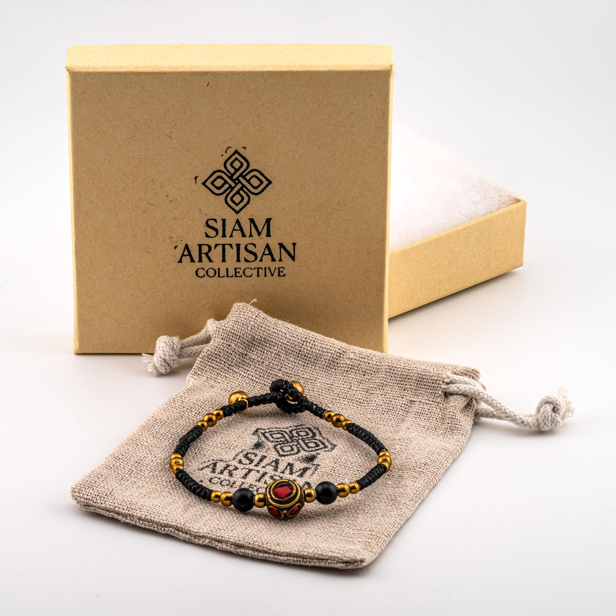Artisan Valor™ Black Cord Bracelet – Handmade Boho Jewelry with Gold & Red Tibetan-Style Center Bead