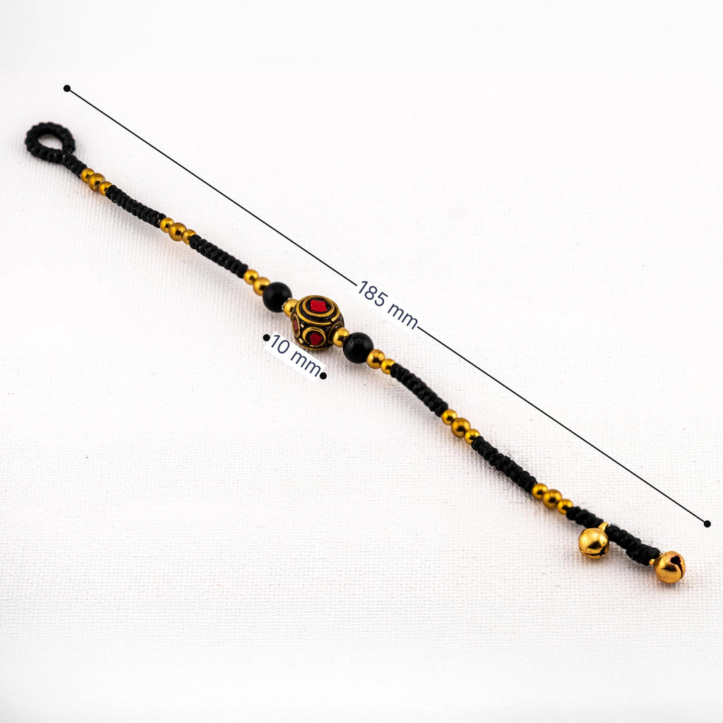 Artisan Valor™ Black Cord Bracelet – Handmade Boho Jewelry with Gold & Red Tibetan-Style Center Bead
